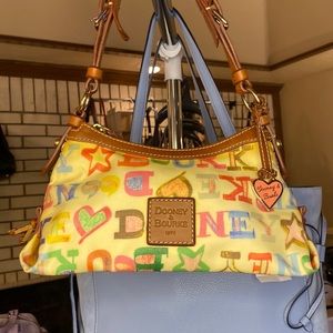 Dooney and Burke Doodle Hobo Bag with the rainbow zipper. Rare find Vintage bag.